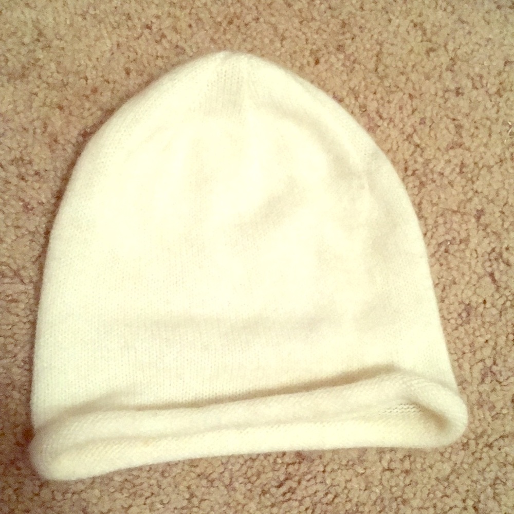 A small, white, Kashmir beanie